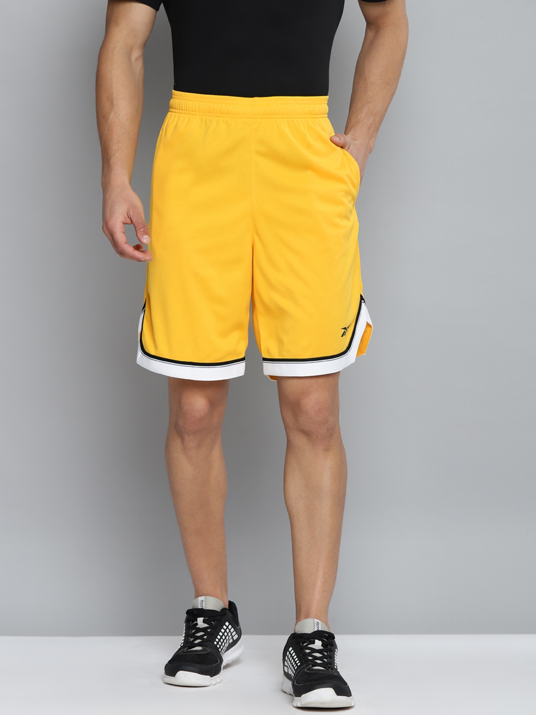 

Reebok Men Yellow Perforated Speedwick Training Workout Ready Mesh Sports Shorts