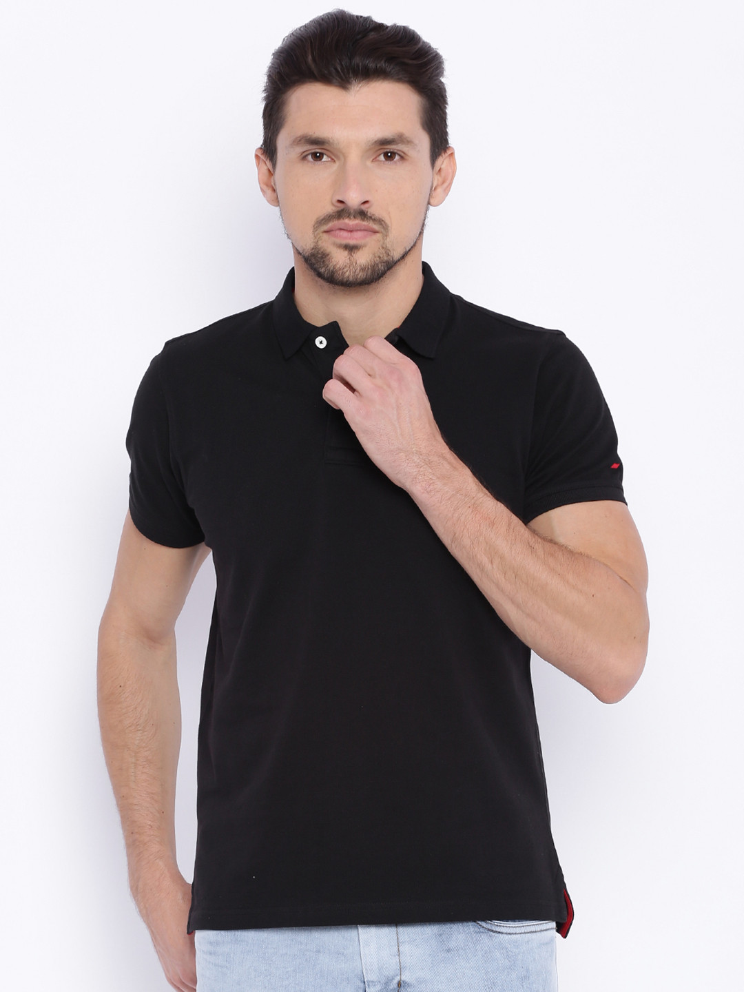 

Basics Men Black Solid Polo T-shirt