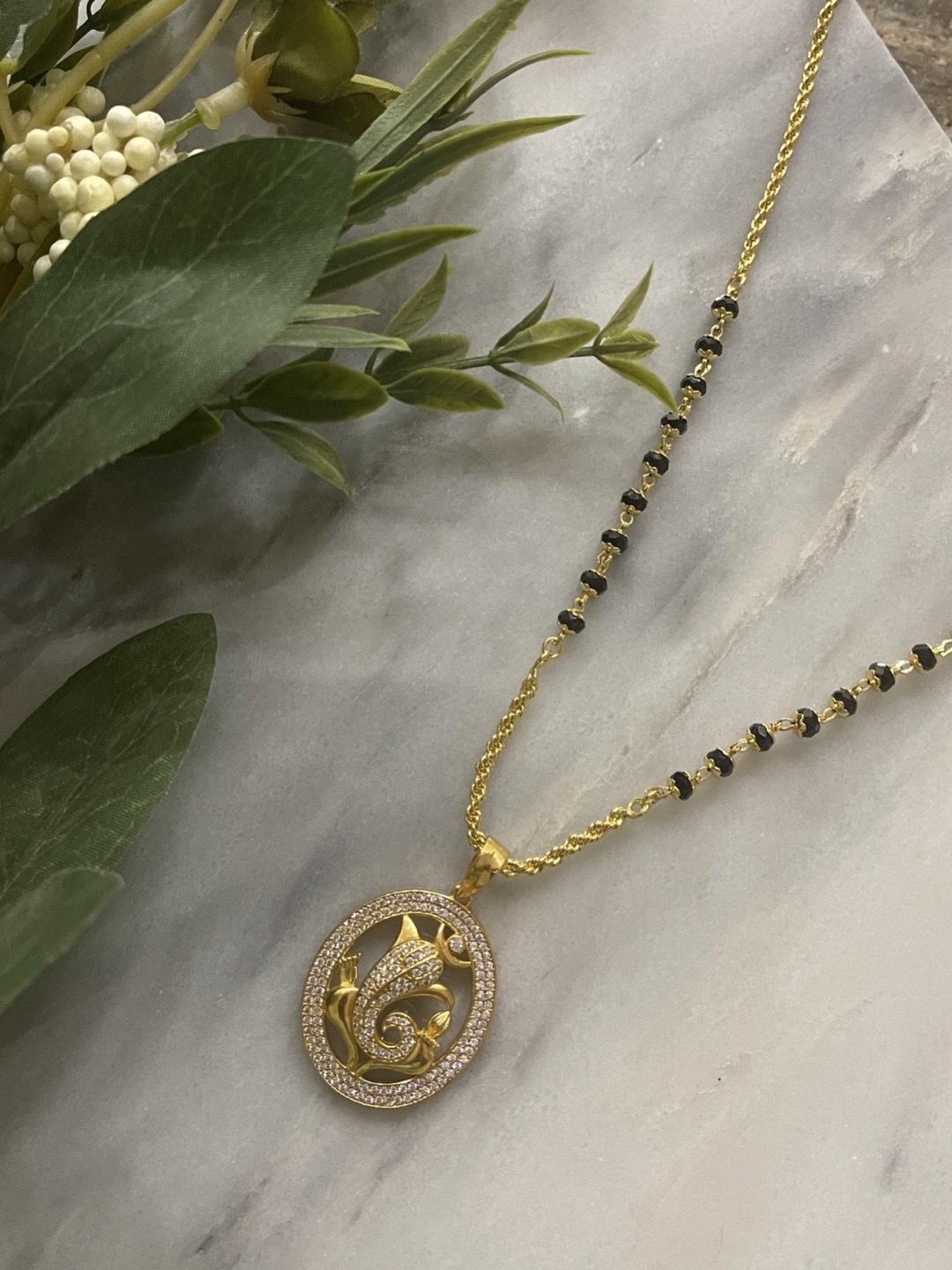 

Digital Dress Room Gold-Plated & Black Beaded Mangalsutra