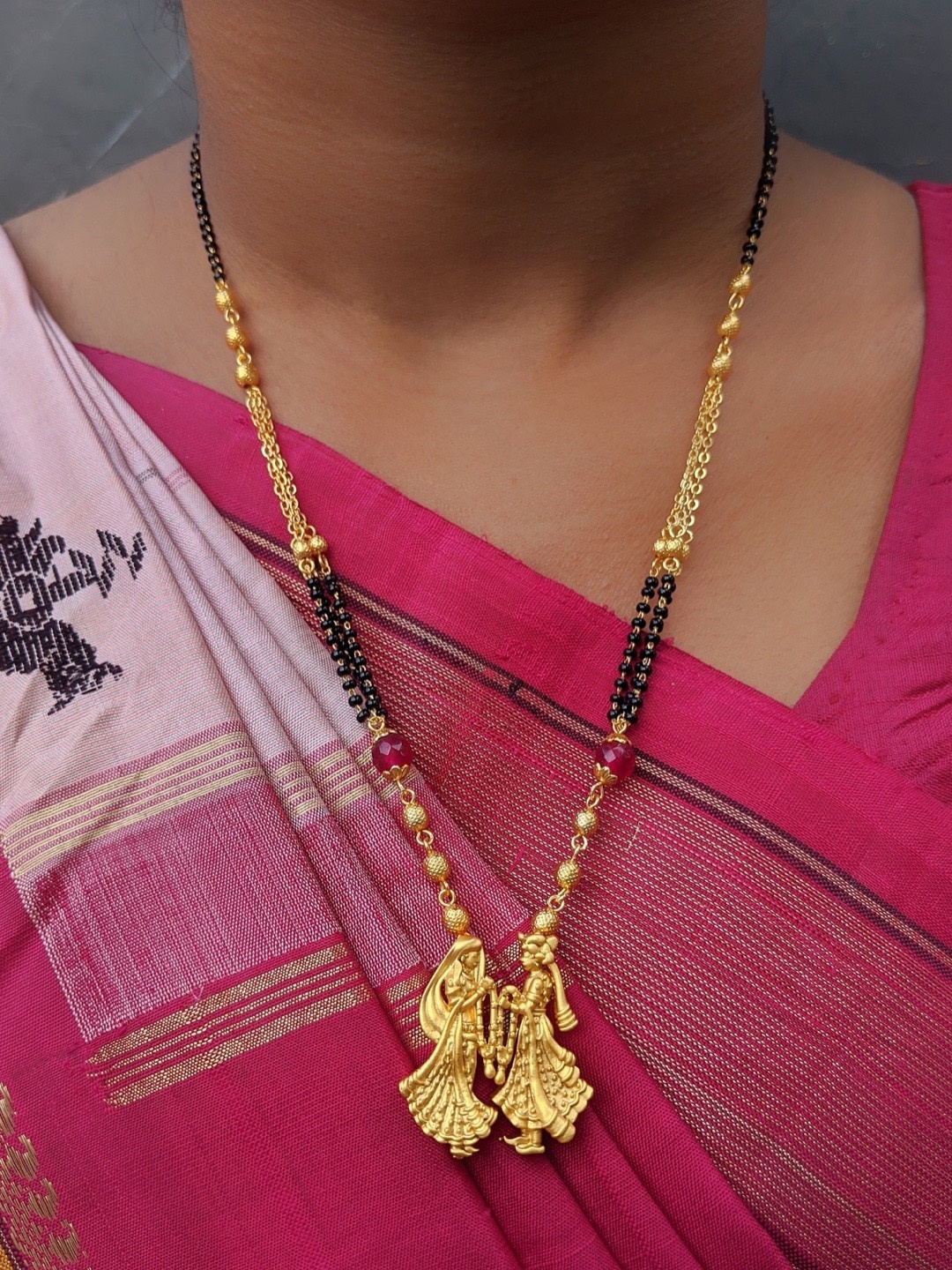 

Digital Dress Room Gold-Plated Pink & Black Beaded Radha Krishna Mangalsutra