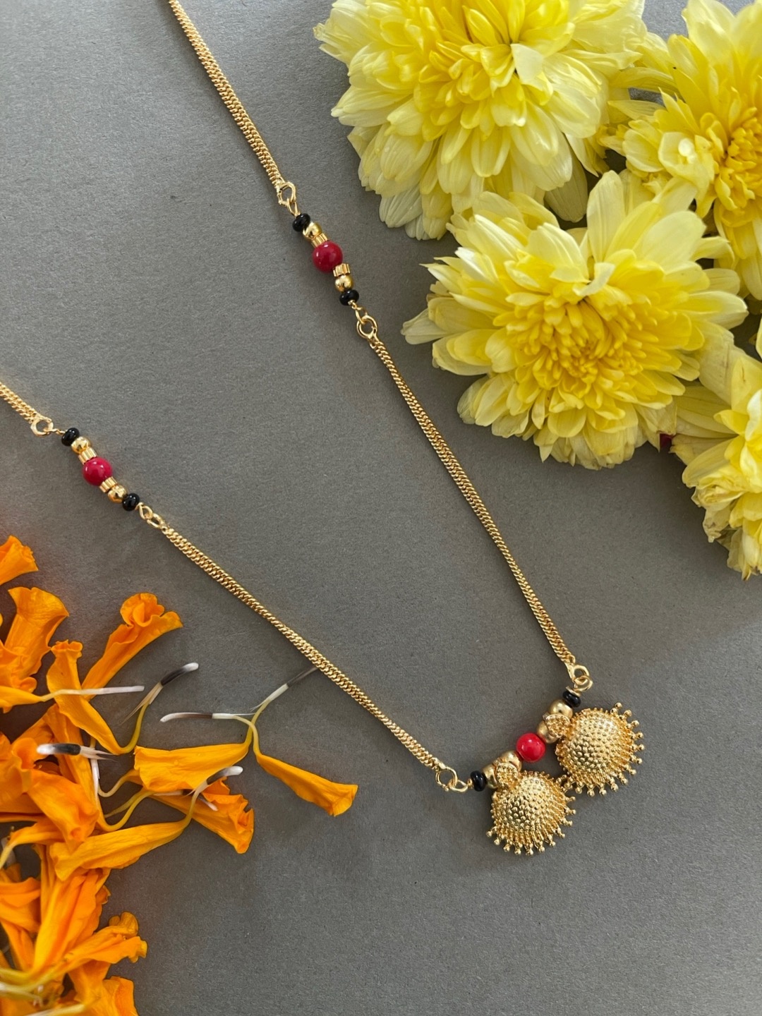

Digital Dress Room Gold-Plated Red & Black Beaded Mangalsutra