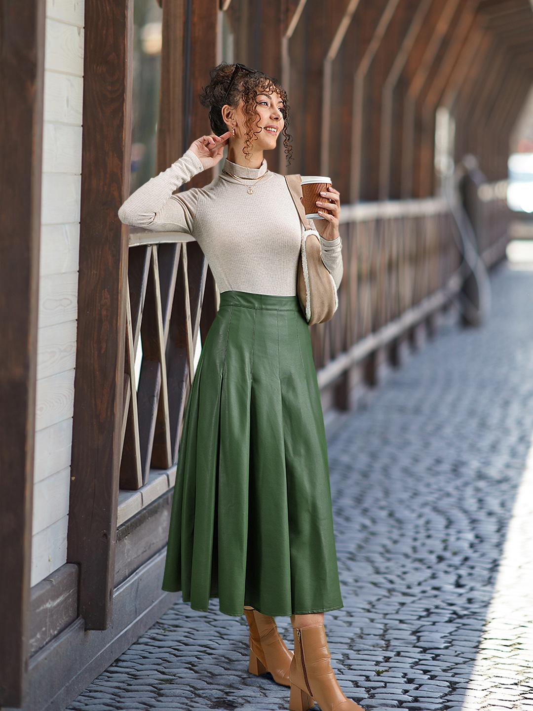 

MANGO Women Green Solid Faux-Leather Pleated Skirt