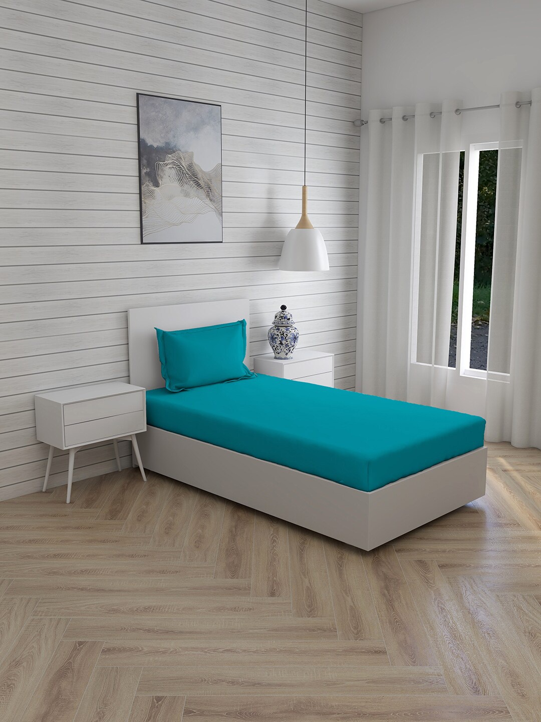 

Layers Blue Solid 144 TC Single 1 Bedsheet with 1 Pillow Cover