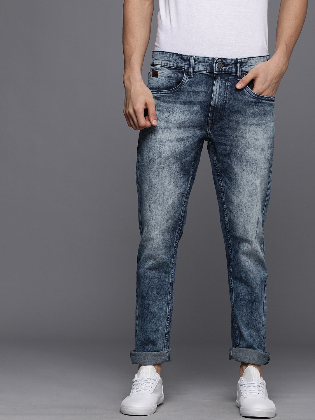 

WROGN Men Blue Heavy Fade Stretchable Mid-Rise Slim Fit Jeans