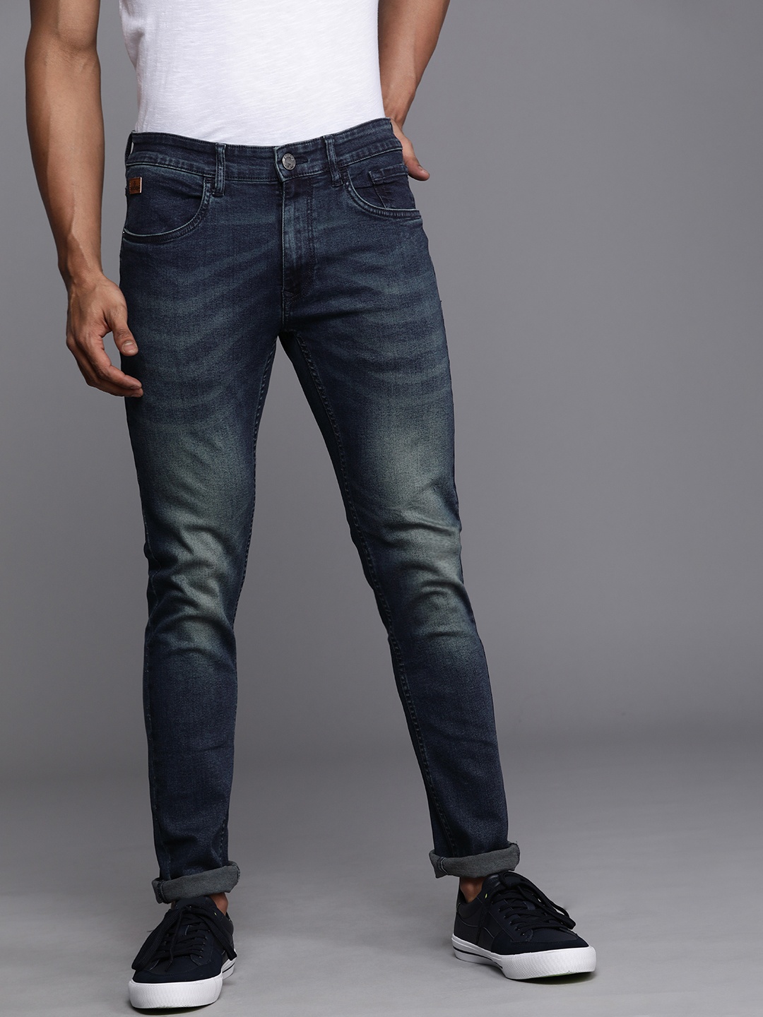 

WROGN Men Blue Slim Fit Light Fade Mid-Rise Stretchable Jeans