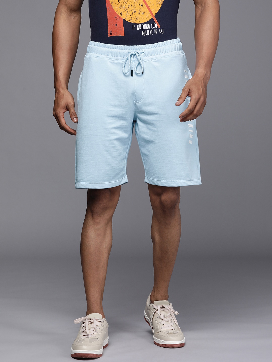 

WROGN Men Light Blue Solid Mid-Rise Applique Regular Shorts