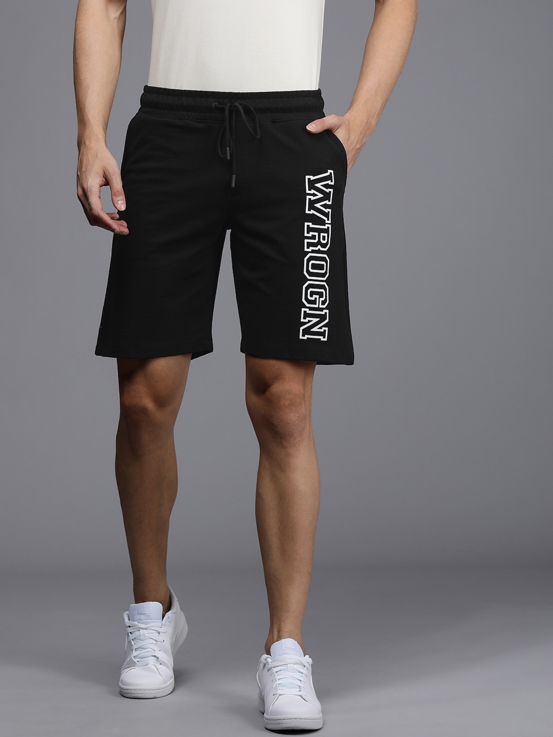 

WROGN Men Black Solid Slim Fit Mid-Rise Monochrome Regular Shorts with Brand Logo Applique