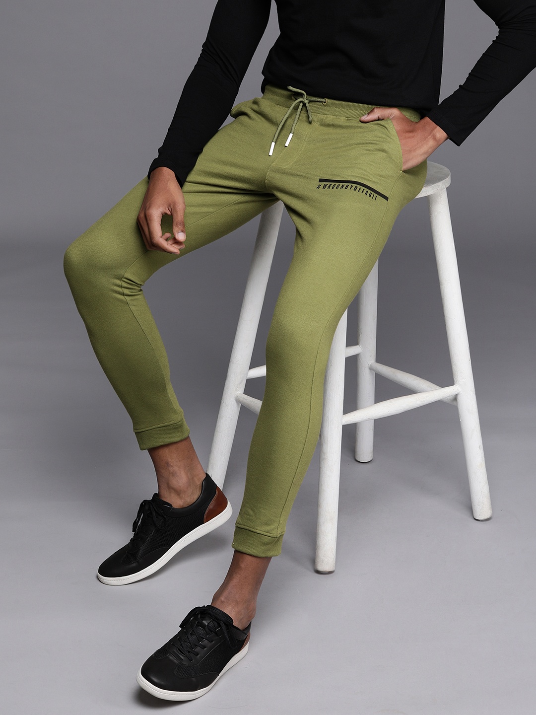 

WROGN Men Green Solid Joggers with Printed Detail