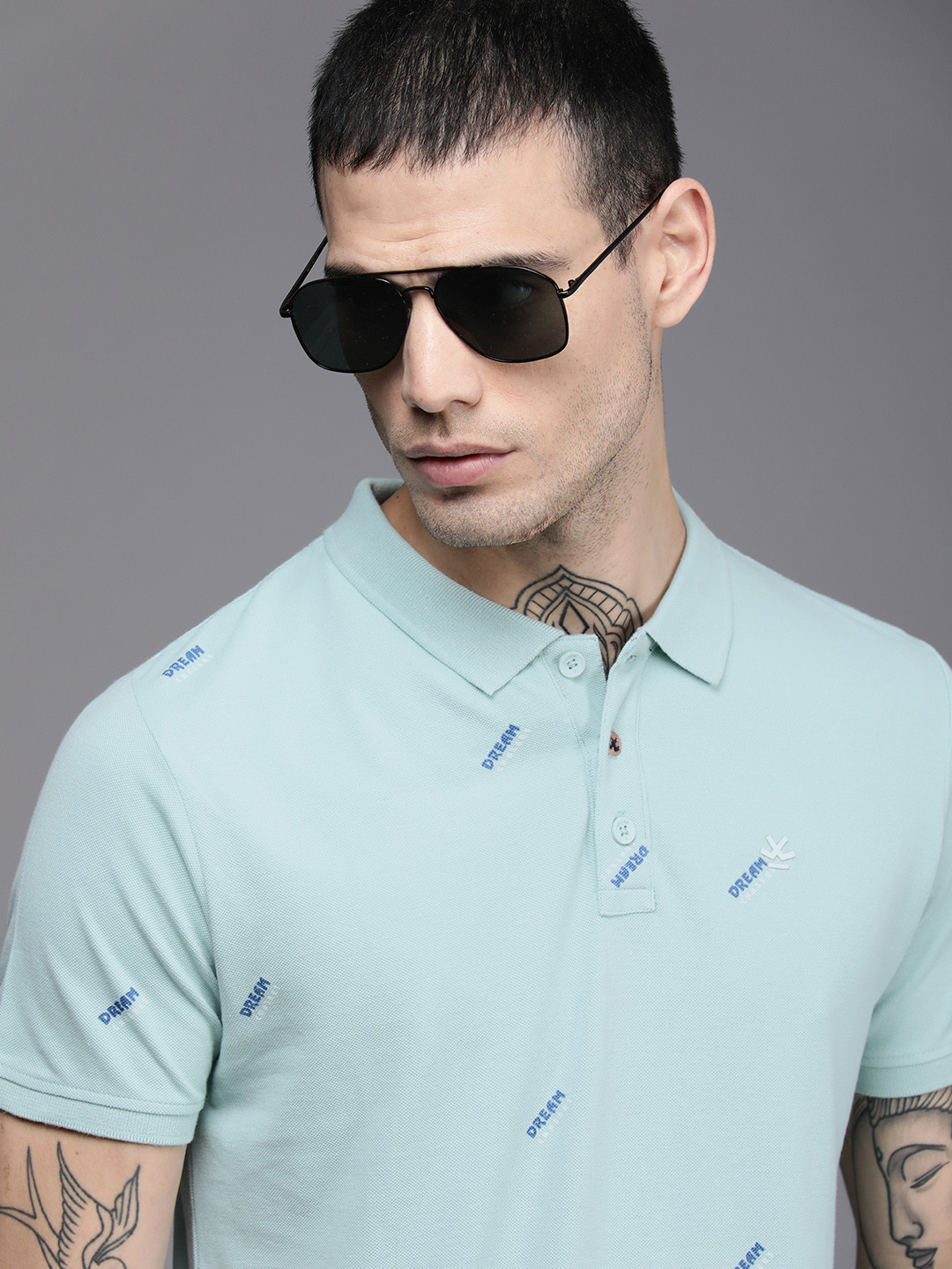 

WROGN Men Sea Green Typography Printed Polo Collar Pure Cotton Slim Fit T-shirt