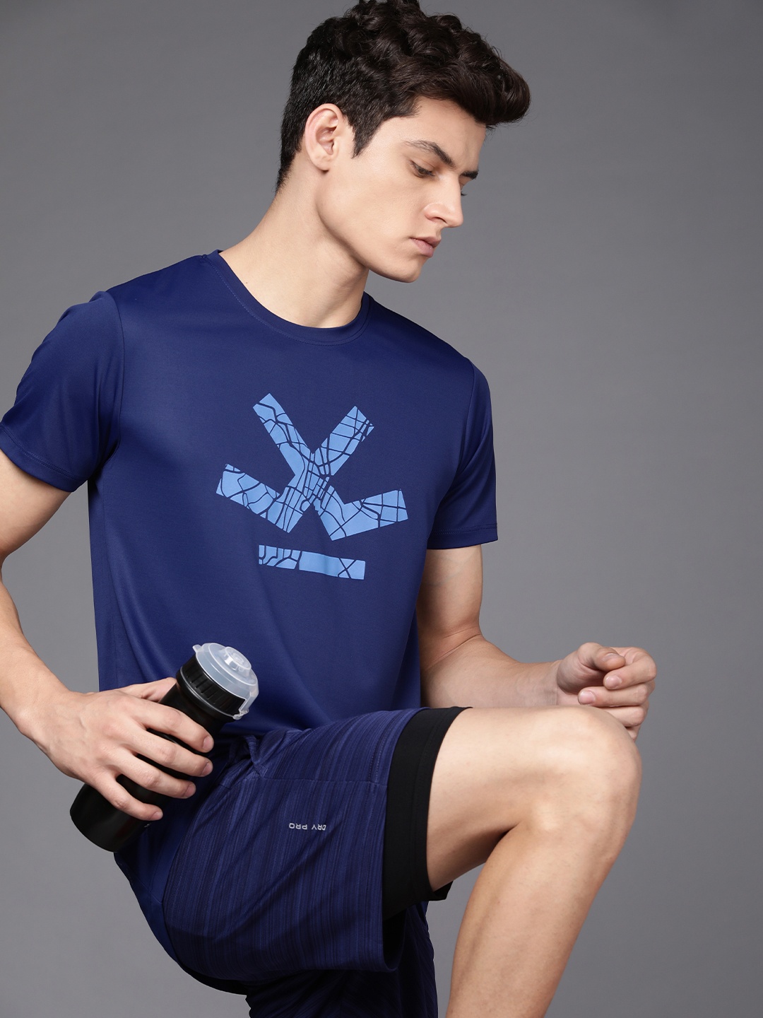 

WROGN ACTIVE Men Navy Blue Brand Logo Printed Slim Fit T-shirt