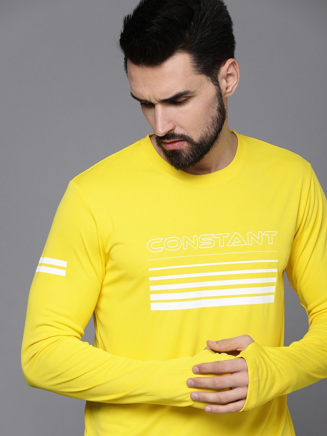 

WROGN ACTIVE Men Yellow Typography Printed Slim Fit Thumbhole T-shirt
