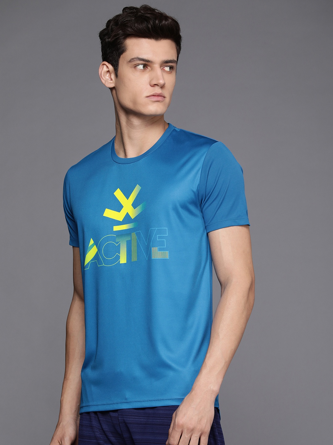 

WROGN ACTIVE Men Blue & Yellow Brand Logo Printed Slim Fit T-shirt