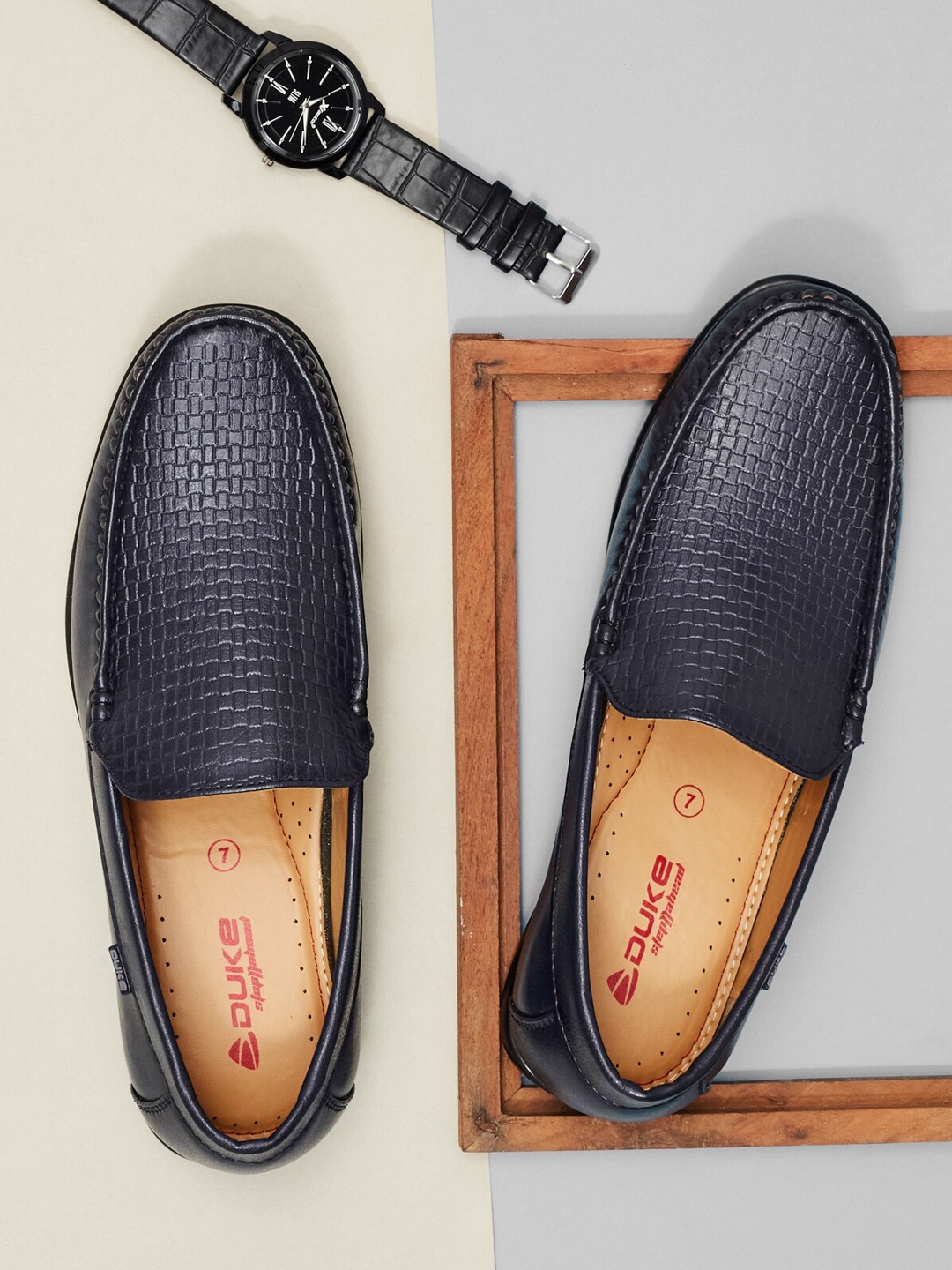 

Duke Men Navy Blue Textured Loafers
