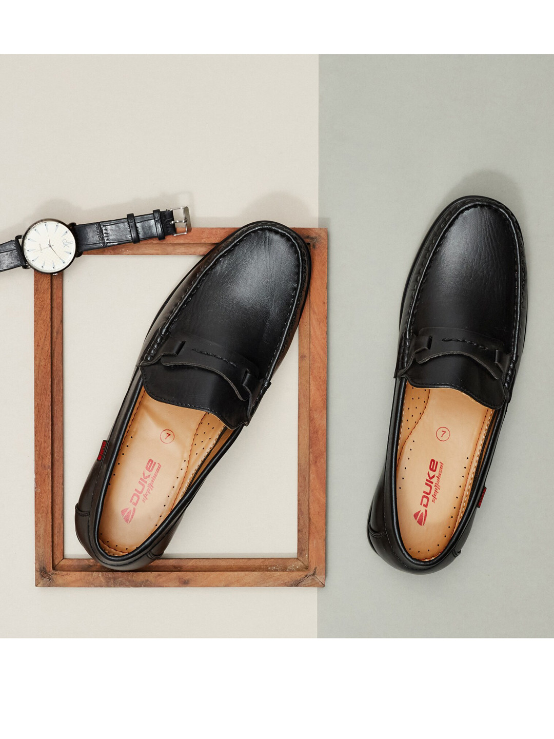 

Duke Men Black Solid Loafers