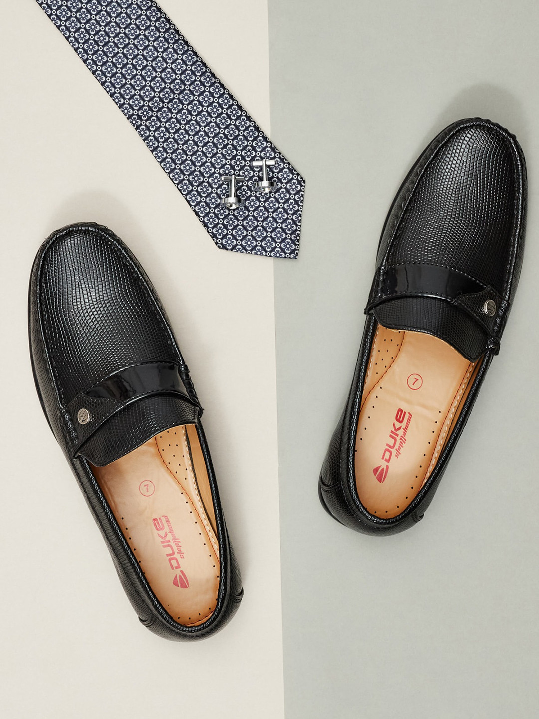 

Duke Men Black Textured Slip-On Loafers