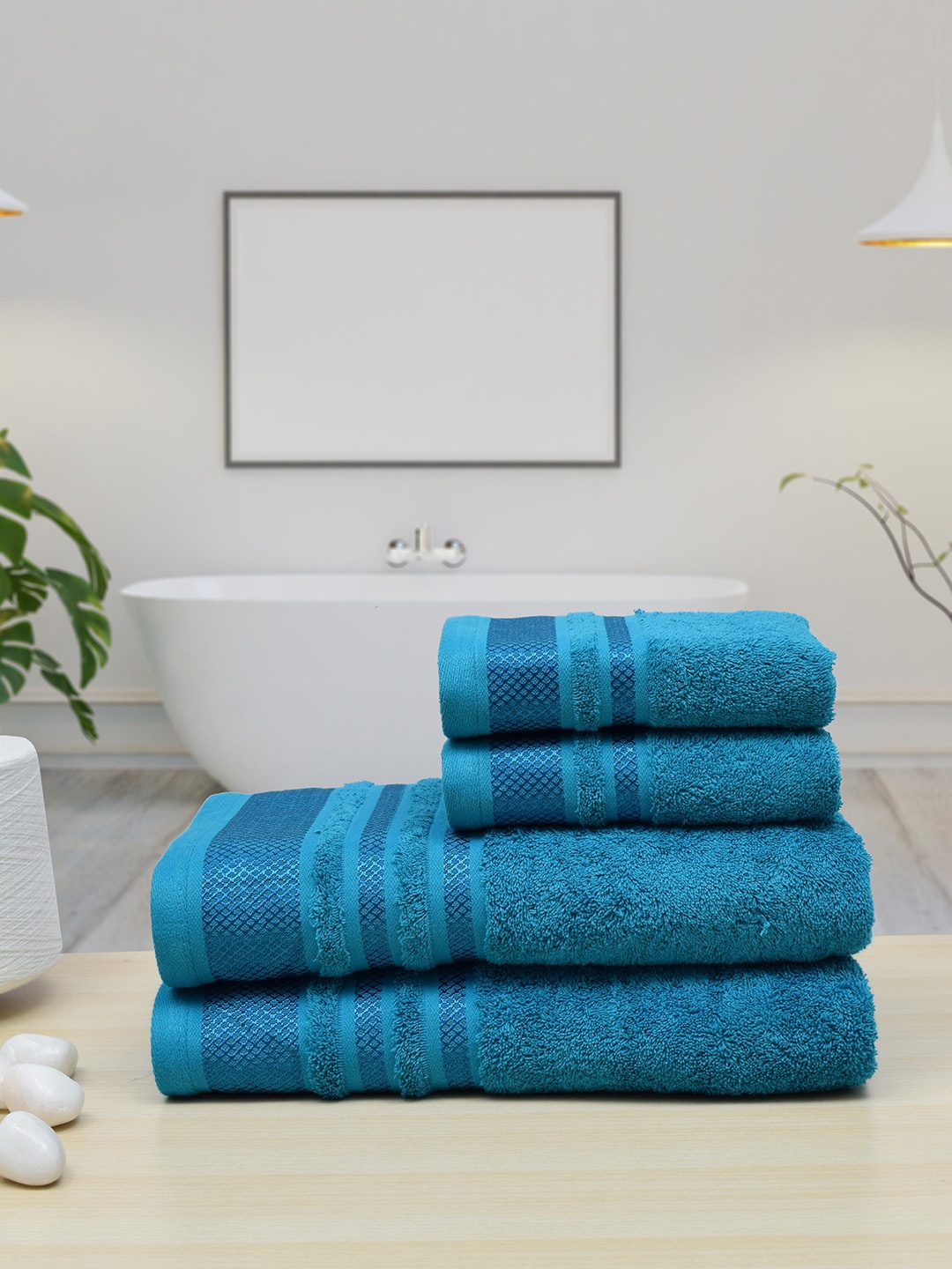 

RANGOLI Set Of 4 Turquoise Blue Soild 550 GSM Pure Cotton Towel Set
