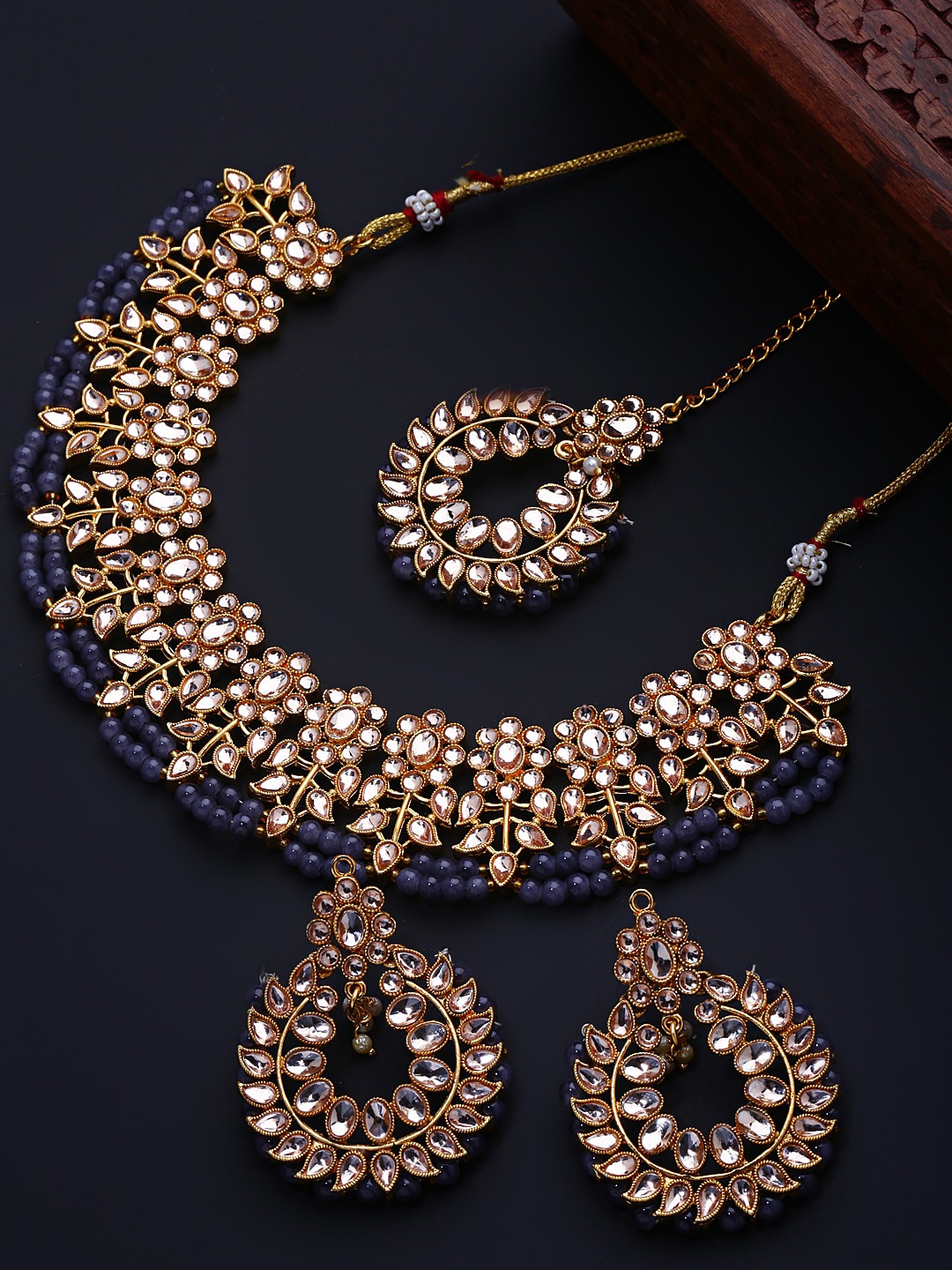 

Shining Diva Gold-Plated White Kundan Studded & Grey Beaded Jewellery Set