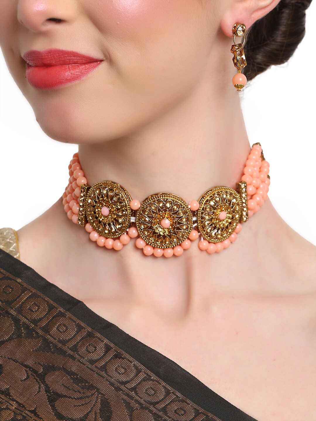 

Shining Diva Gold-Plated Beige & Orange Kundan-Studded & Beaded Jewellery Set