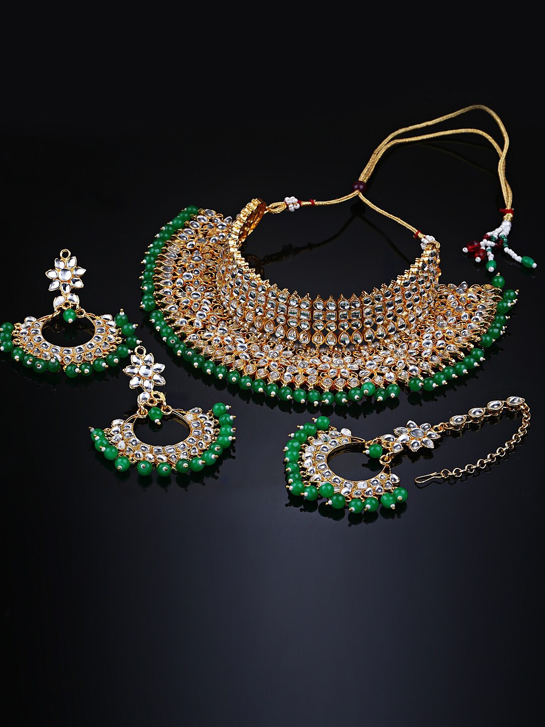 

Shining Diva Green & White Gold-Plated Kundan-Studded & Beaded Jewellery Set