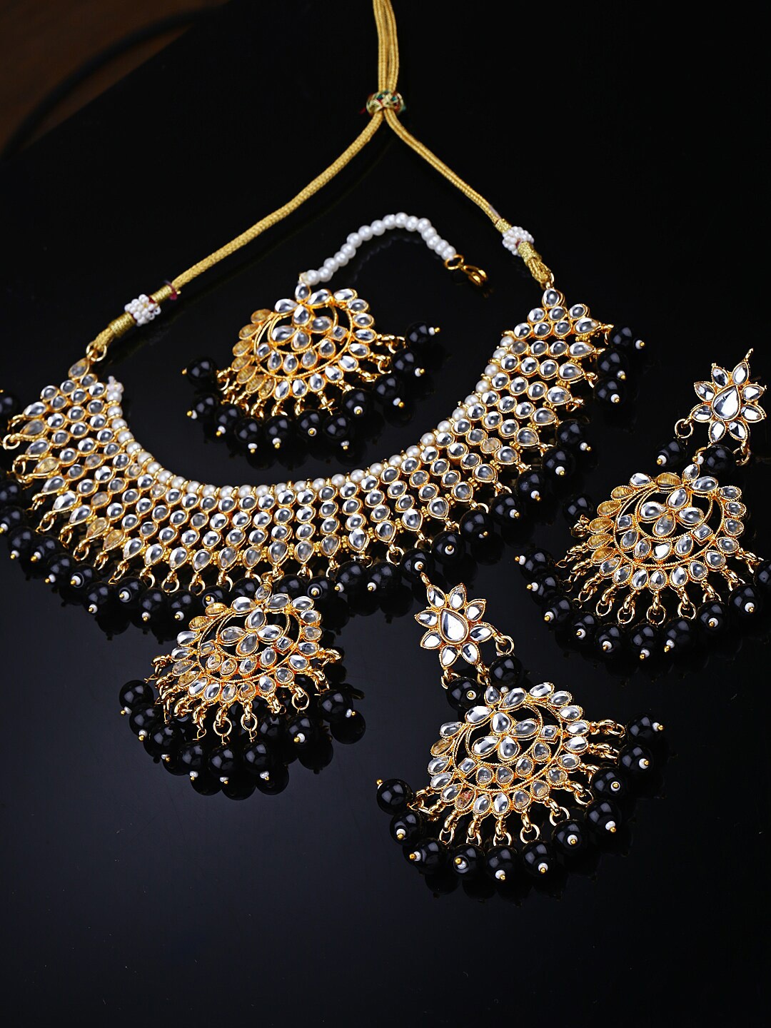 

Shining Diva Gold-Plated & Black Kundan Studded & Beaded Jewellery Set