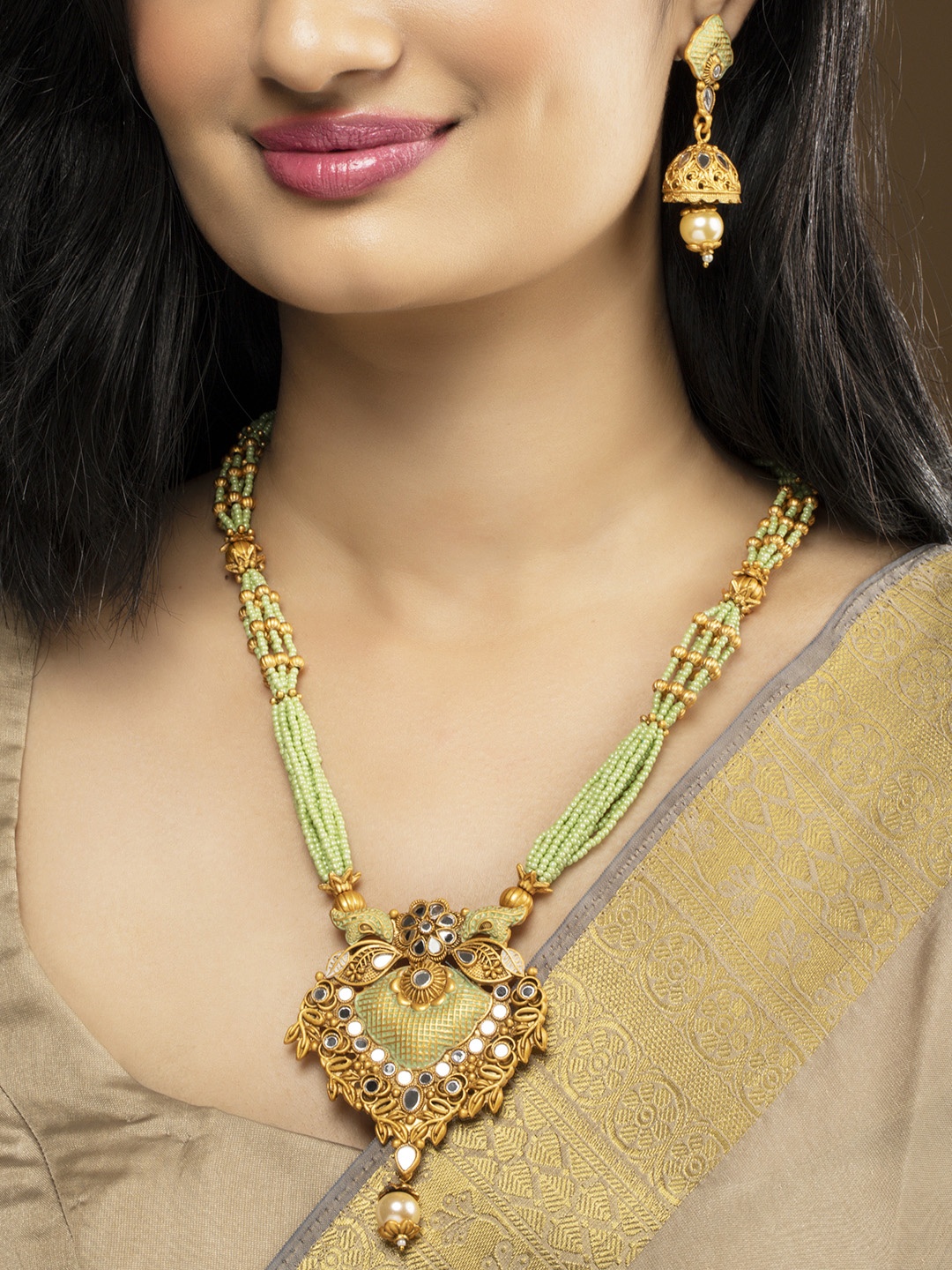 

Rubans Gold Plated Green Beaded Hand Painted Mirror Work Jewellery Set