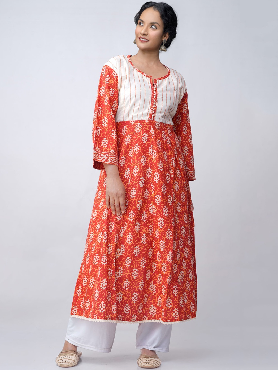 

Unnati Silks Women Red & White Dabu Printed Rajasthani Printed Cotton Anarkali Kurta