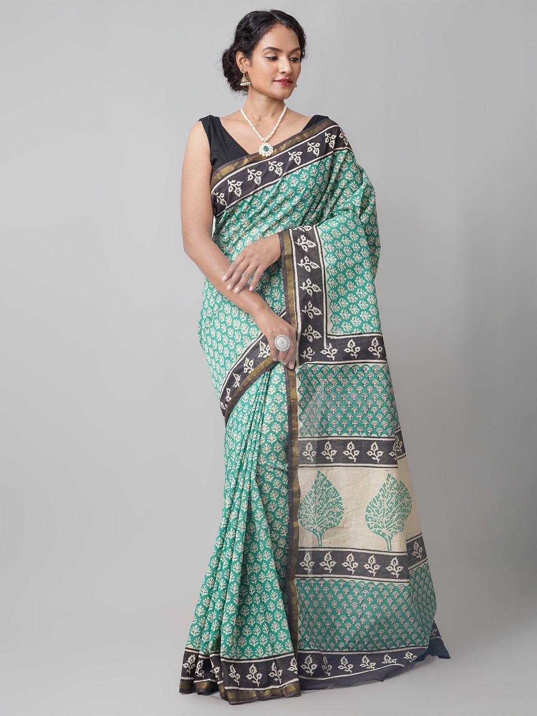 

Unnati Silks Green Printed Bagh Maheshwari Silk Cotton Saree