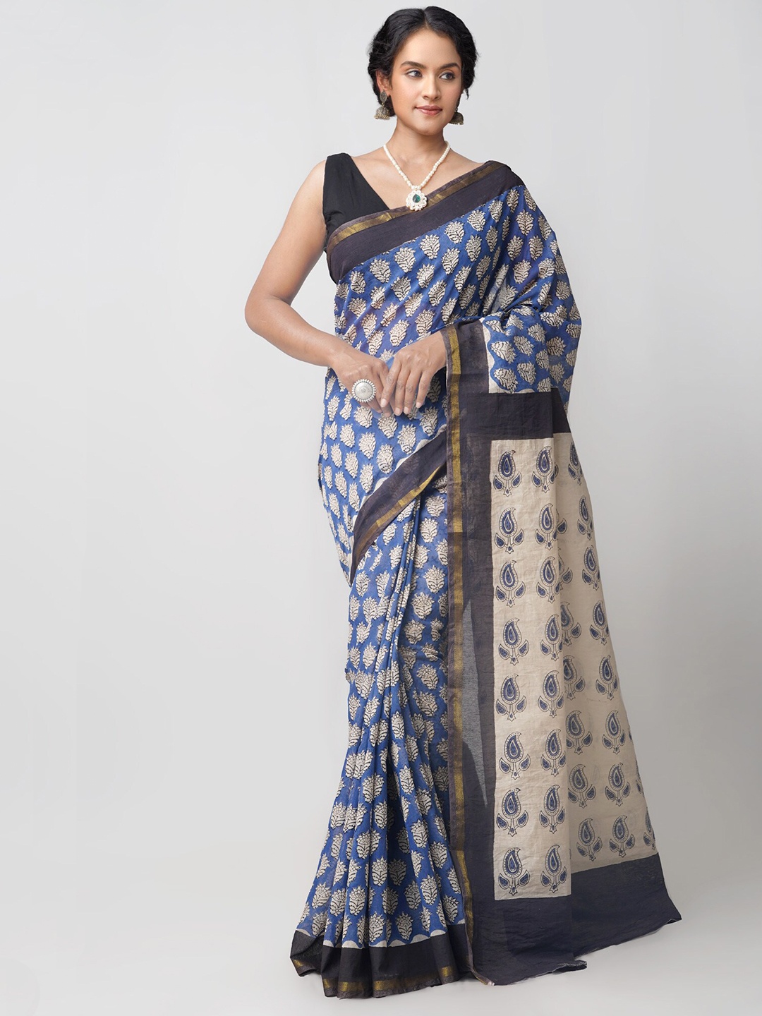 

Unnati Silks Blue & Beige Bagh Zari Silk Cotton Maheshwari Saree