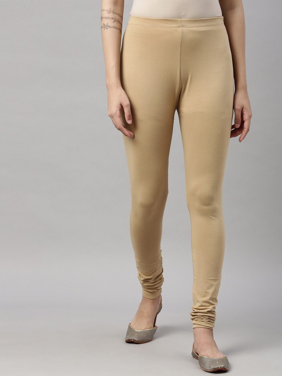 

GOLDSTROMS Women Beige Solid Churidar-Length Leggings