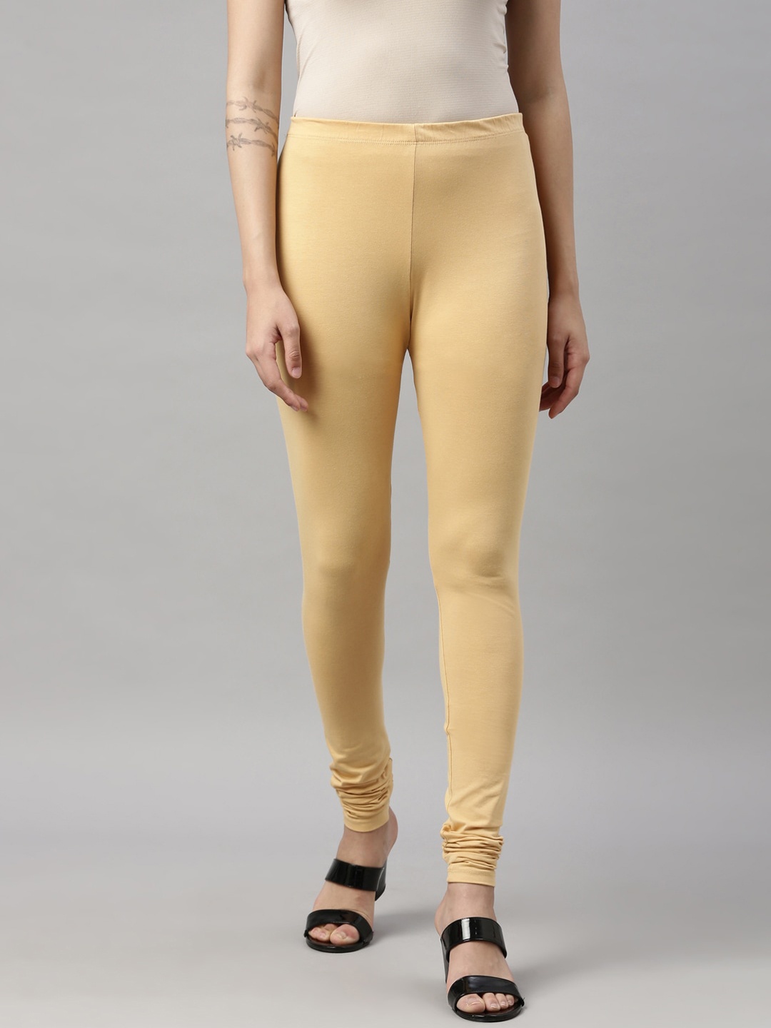 

GOLDSTROMS Women Beige Solid Churidar-Length Leggings