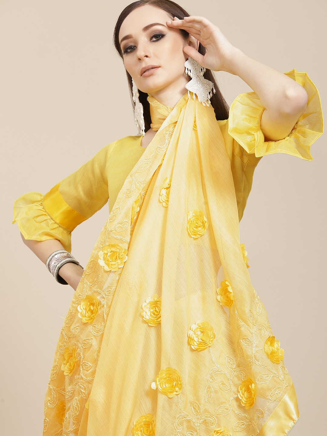 

Mitera Yellow Ethnic Motifs Embroidered Saree