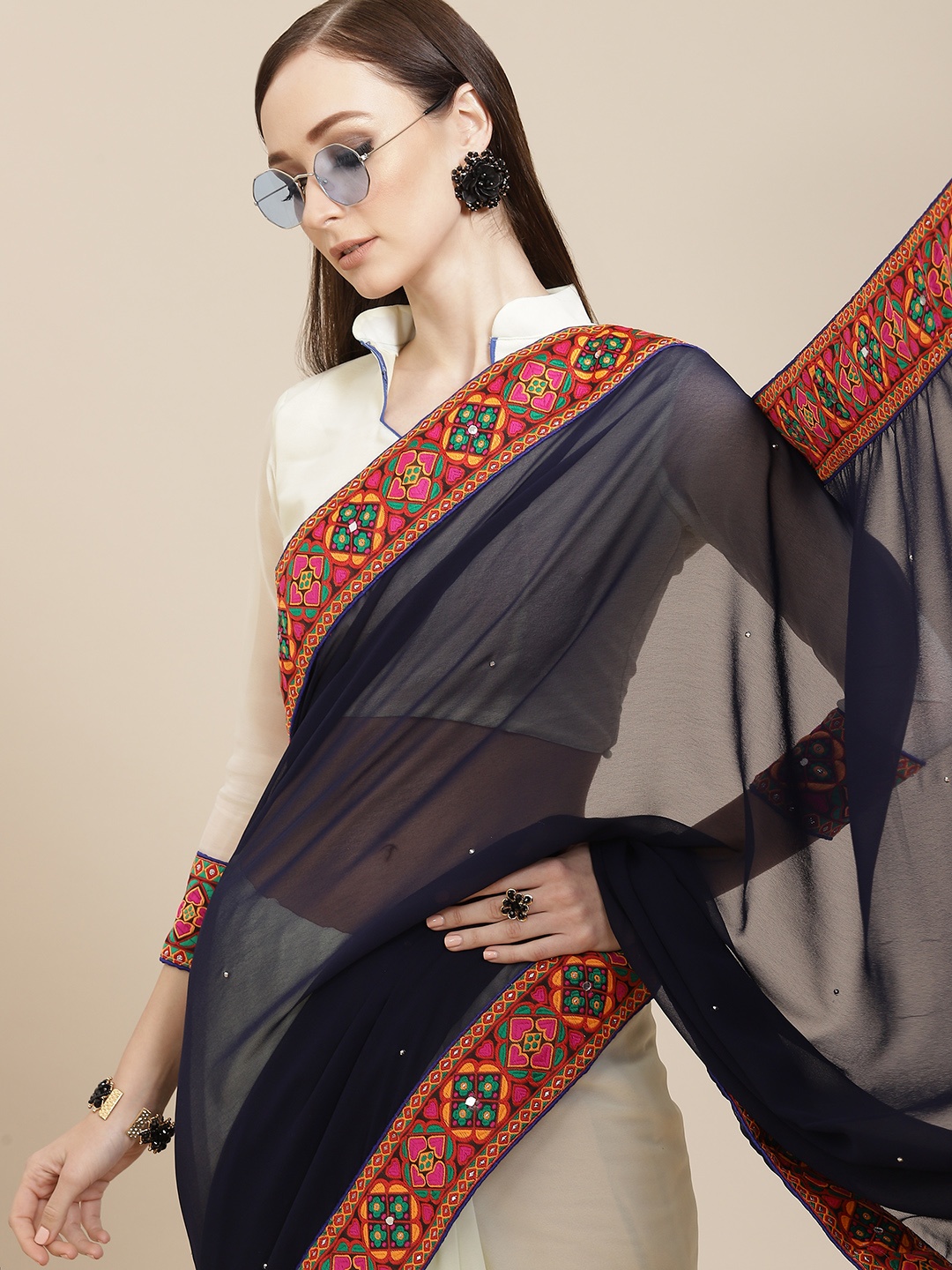 

Mitera Navy Blue & White Ethnic Motifs Embroidered Pure Georgette Saree