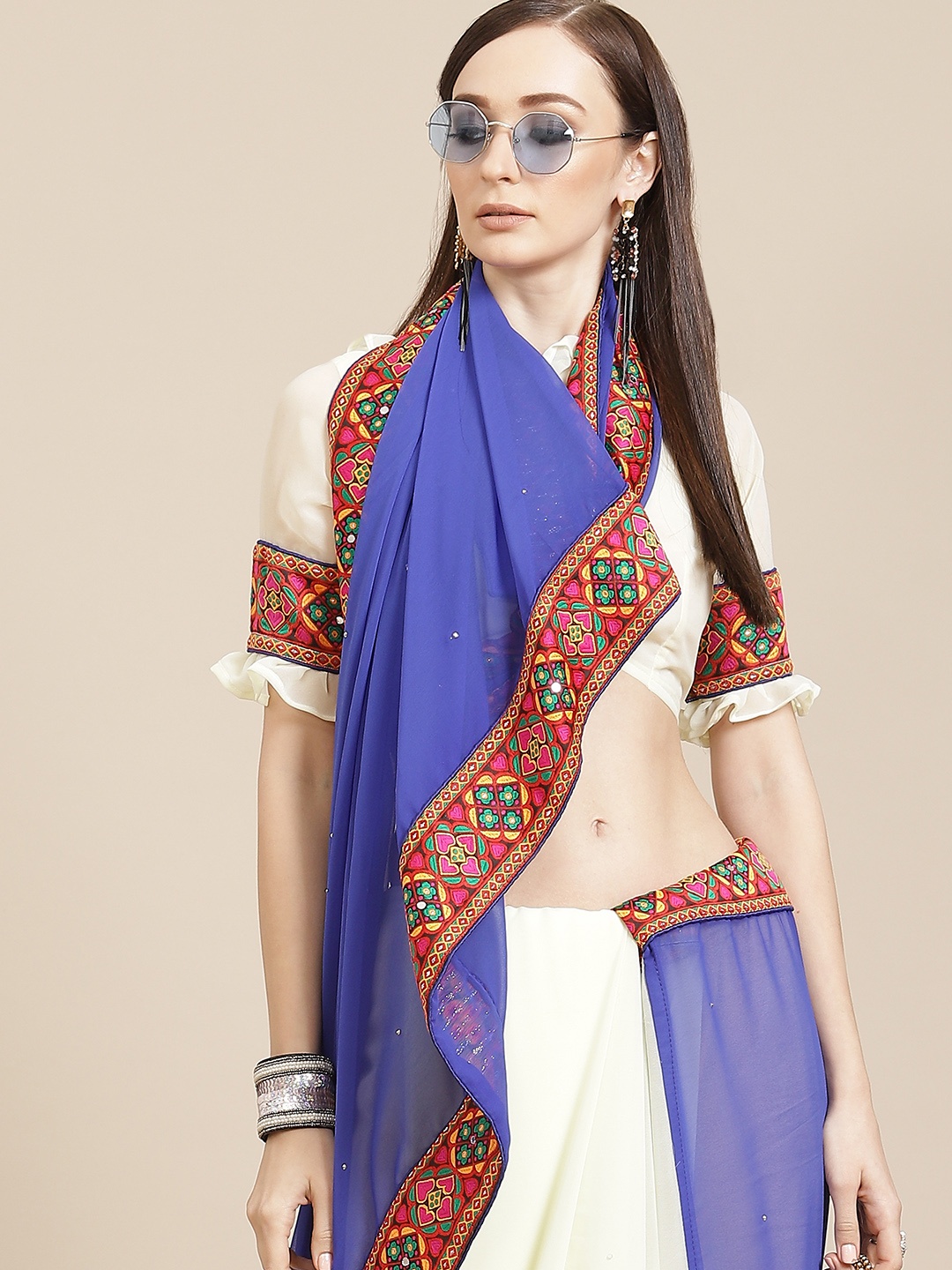 

Mitera Blue & White Ethnic Motifs Embroidered Saree
