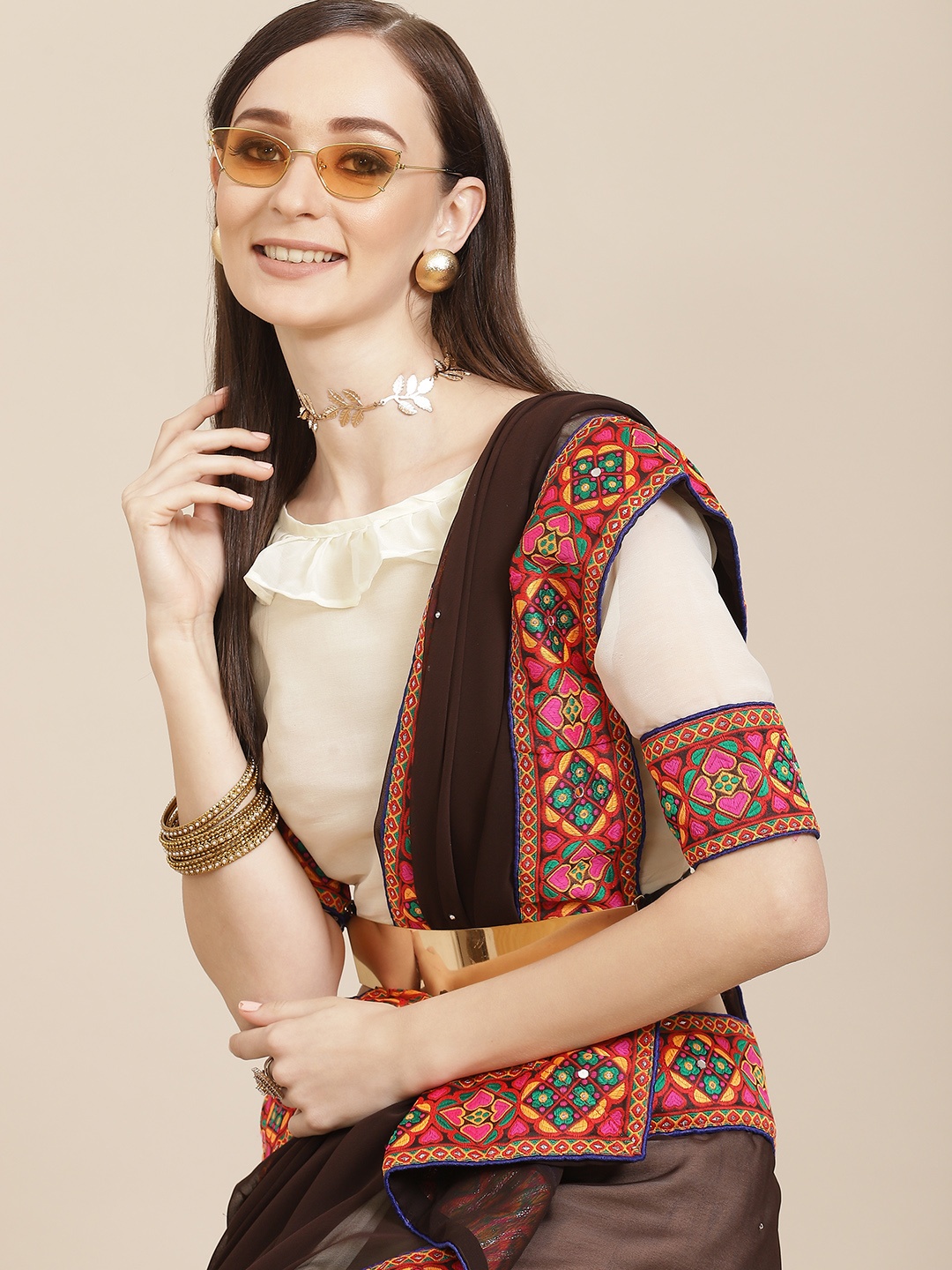 

Mitera Brown & Off White Ethnic Motifs Embroidered Pure Georgette Half and Half Saree