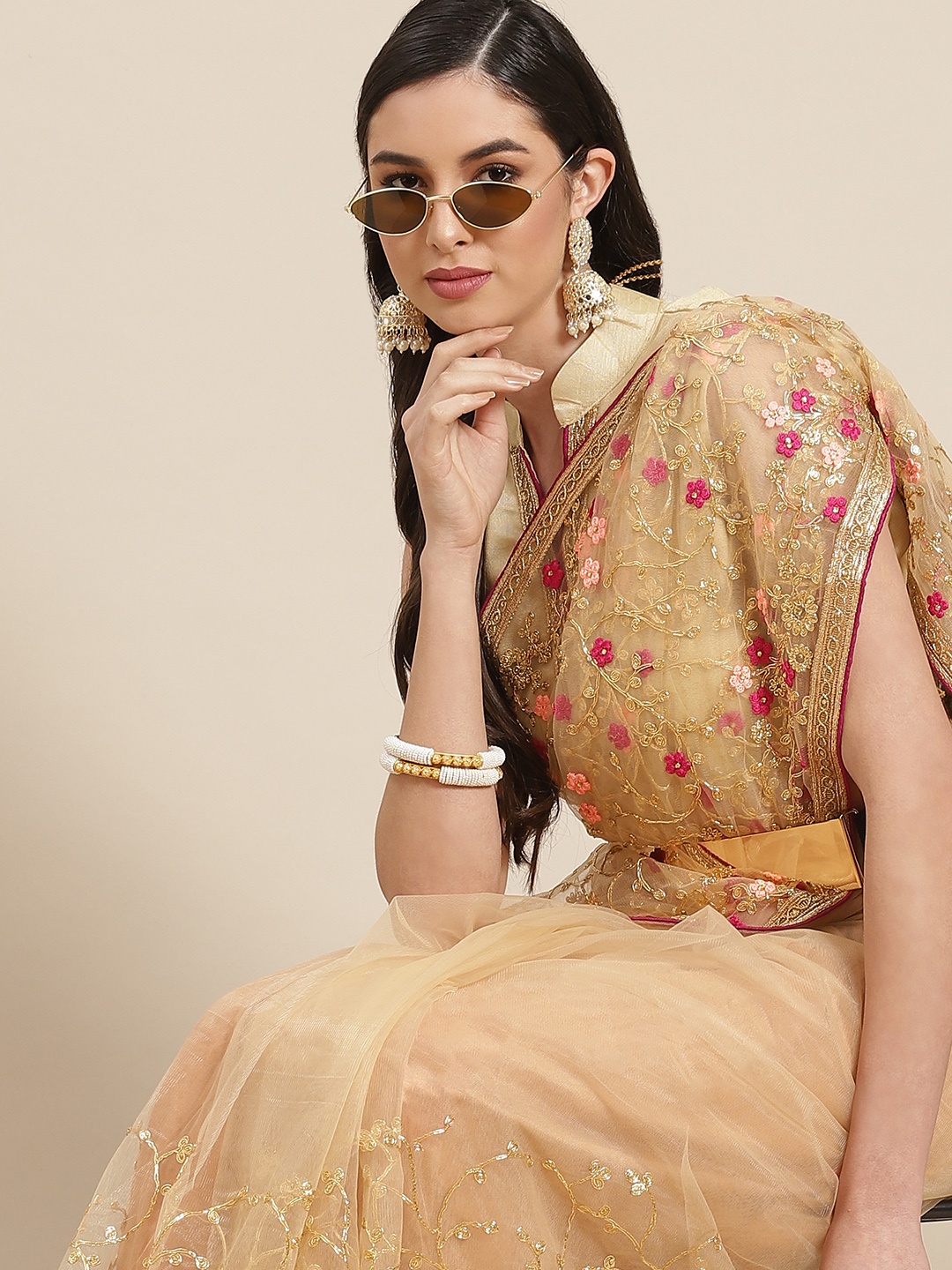 

SERONA FABRICS Golden & Pink Ethnic Motifs Embroidered Net Saree, Gold