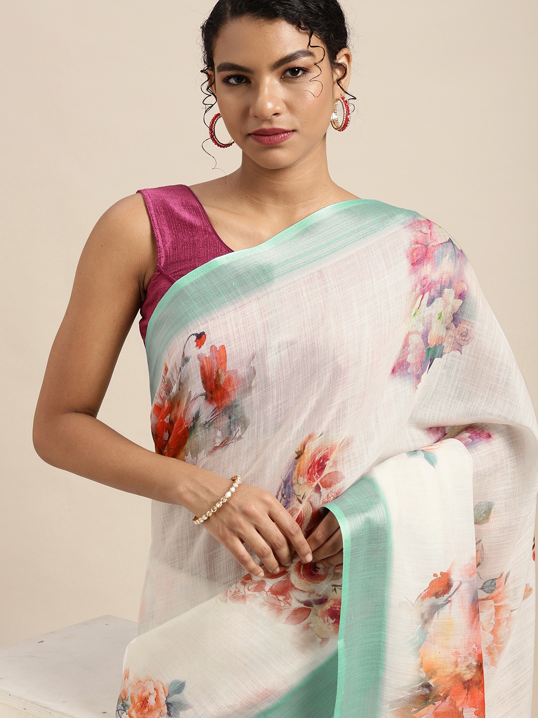 

Mitera White & Orange Floral Pure Linen Zari Digital Printed Saree