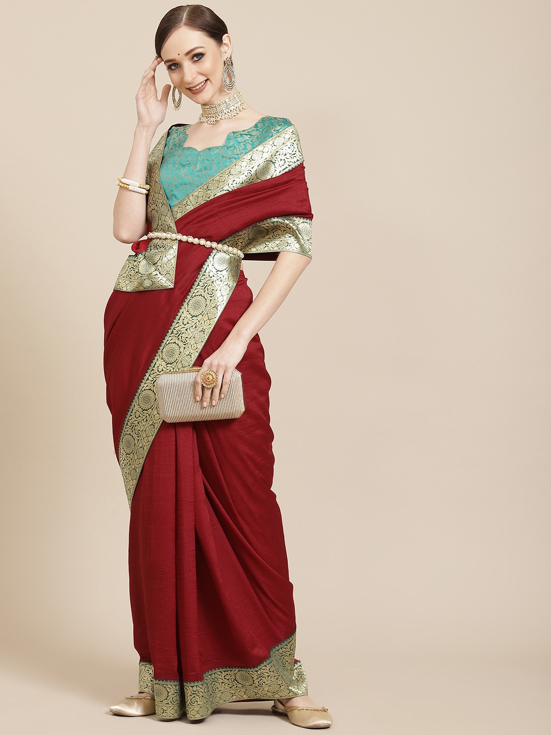 

KALINI Maroon & Golden Solid Woven Design Saree