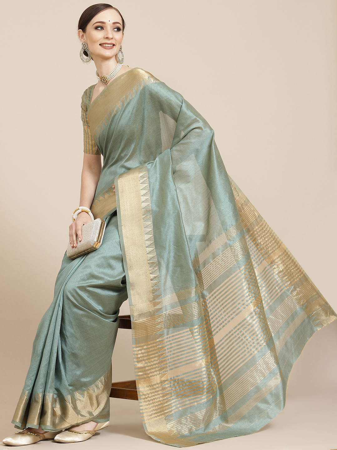 

KALINI Green & Golden Solid Woven Design Saree