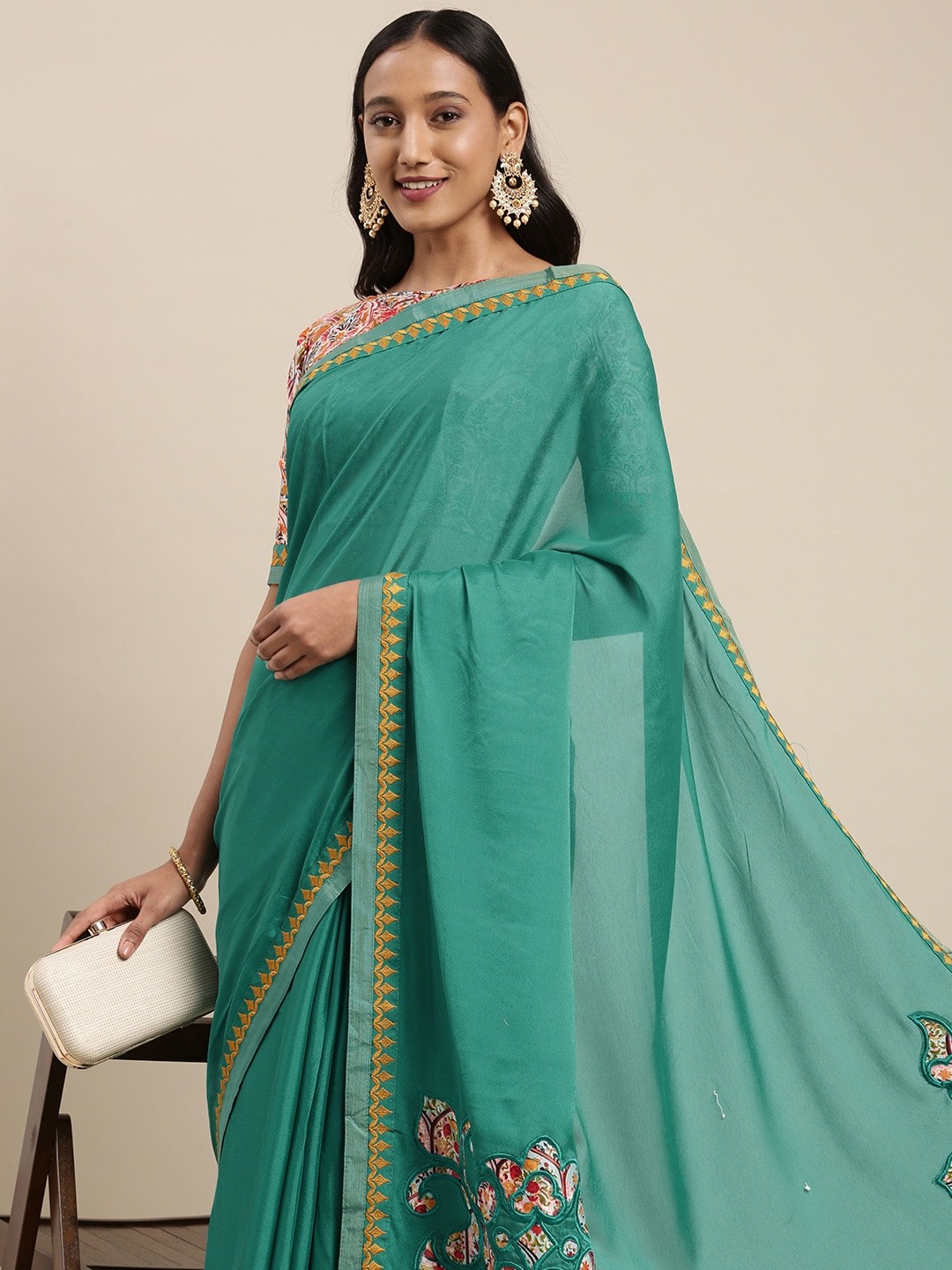 

Mitera Sea Green Ethnic Motifs Patchwork Satin Saree