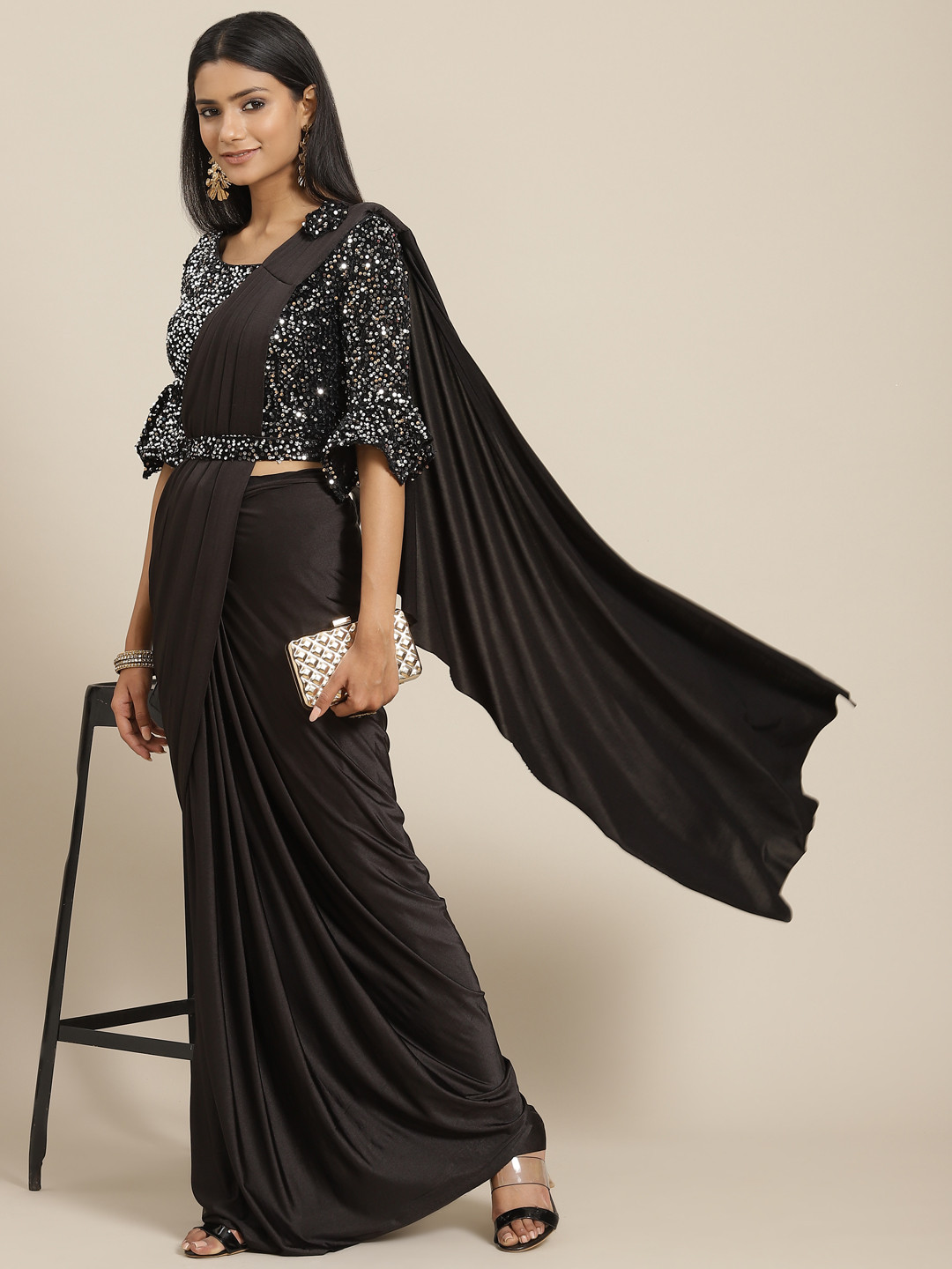 

Grancy Women Black Solid Ready to Wear Saree
