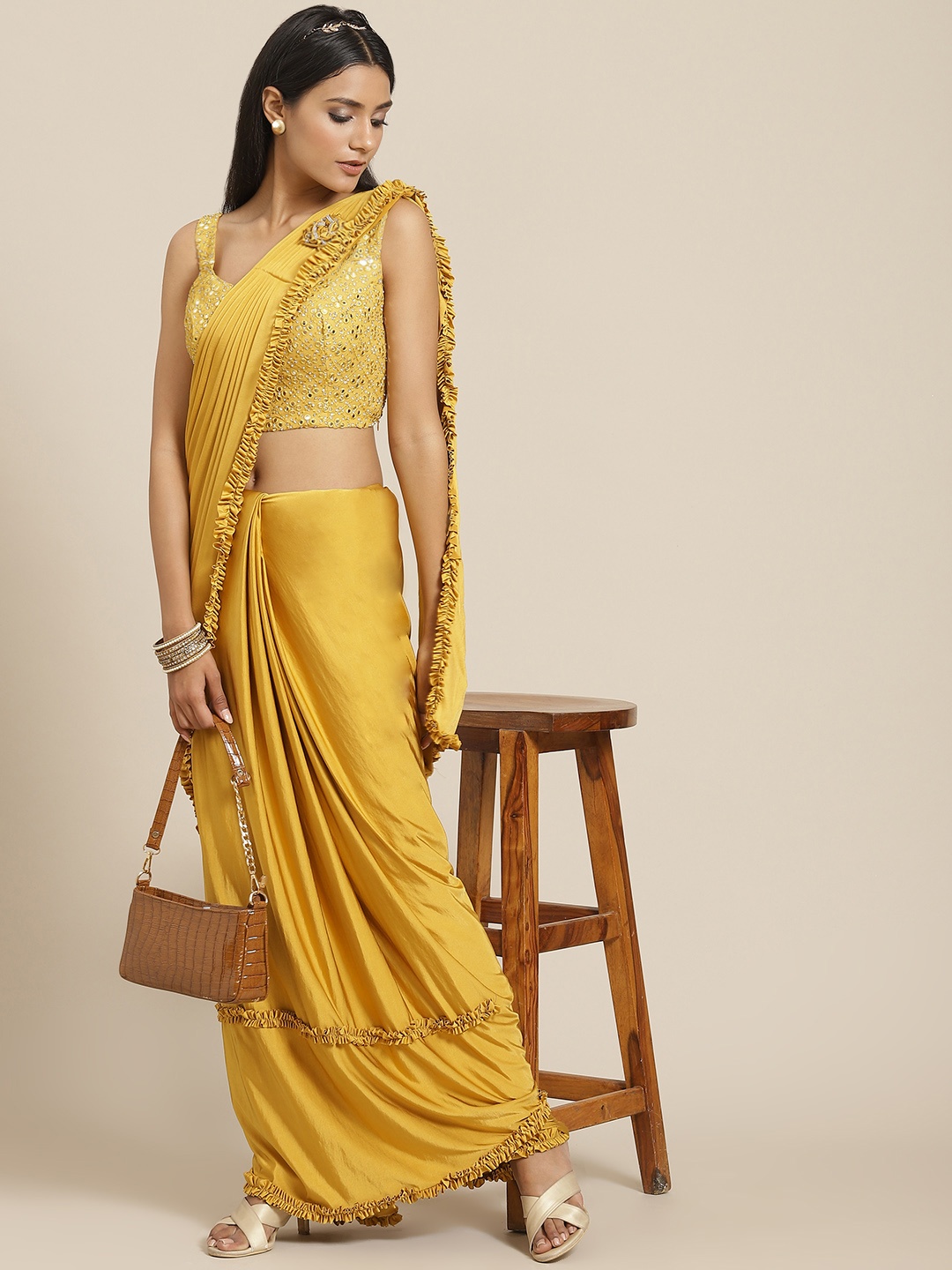 

Grancy Women Mustard Yellow Solid Ruffle Ready to Wear Saree