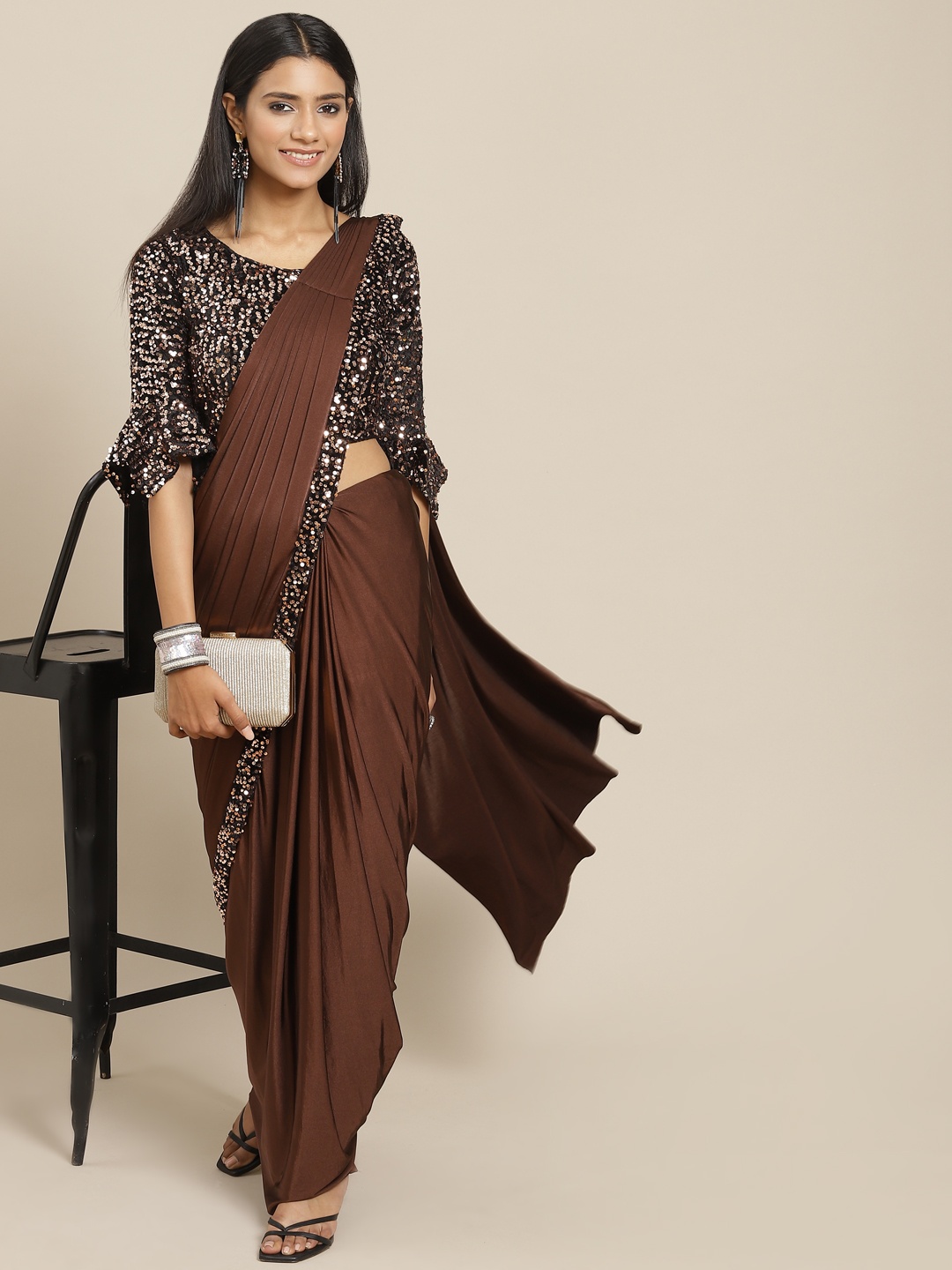 

Grancy Women Brown Solid Ready to Wear Saree
