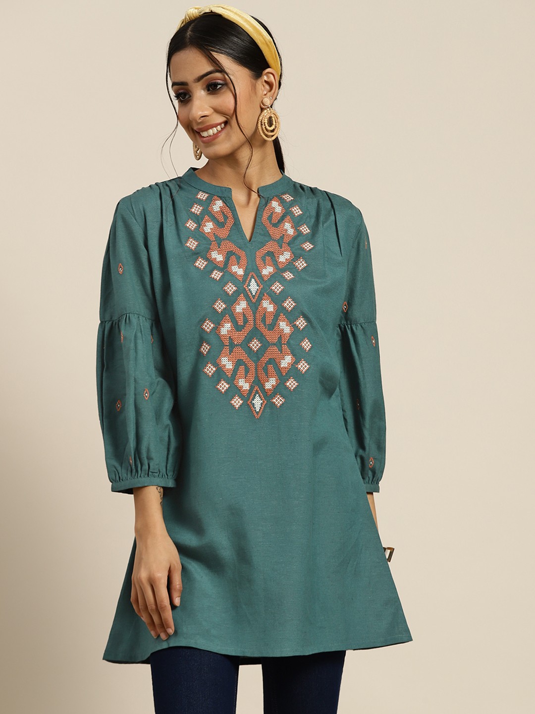 

Sangria Teal Blue & Orange Embroidered Pure Cotton Kurti