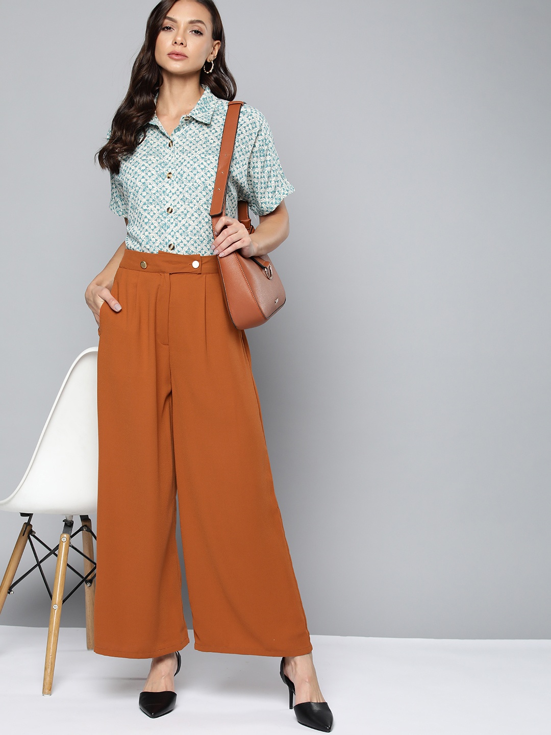 

Chemistry Women Rust Orange Solid Pleated Flared Trousers