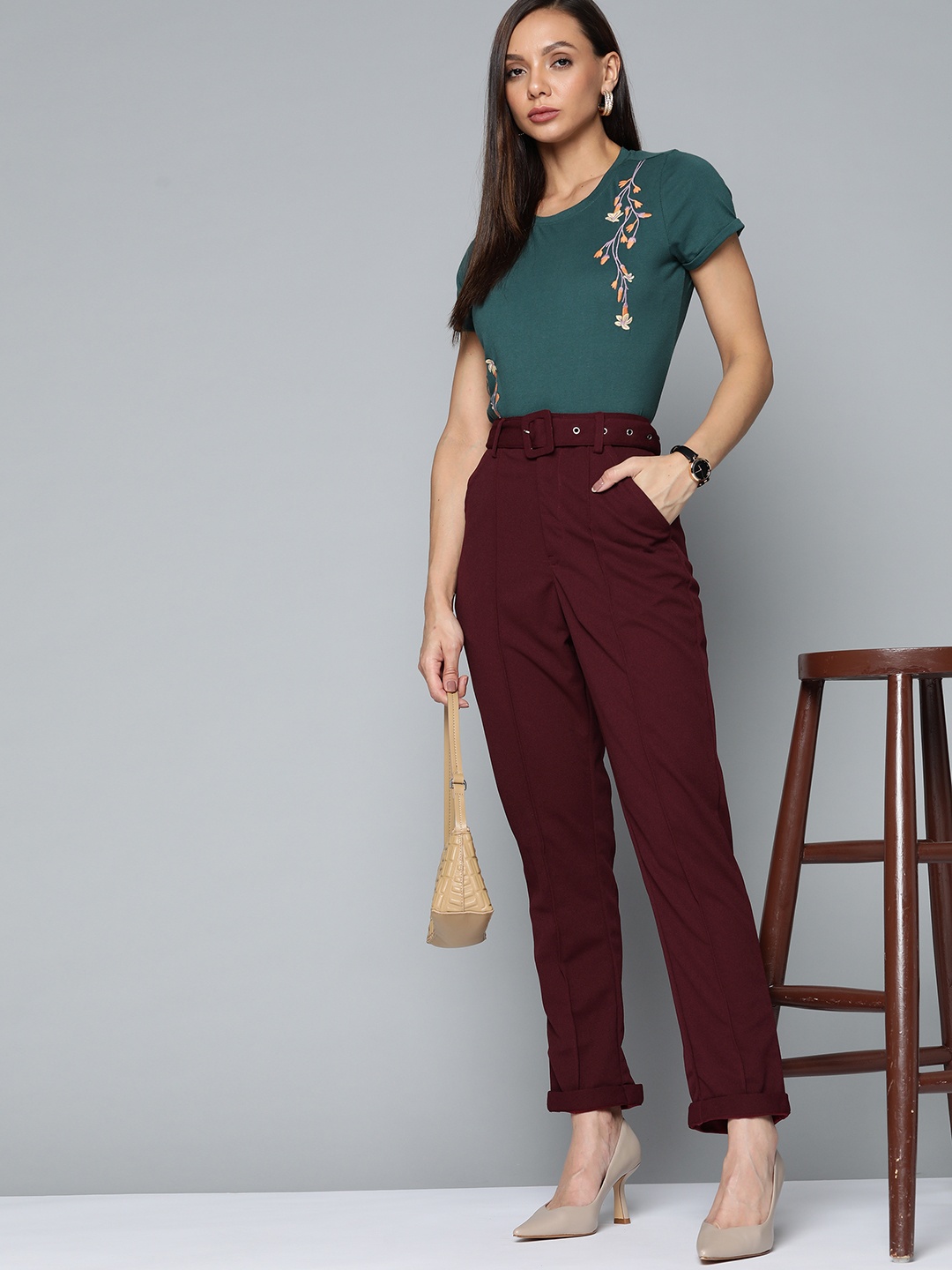 

Chemistry Women Maroon Solid Pleated Trousers Comes with a Belt