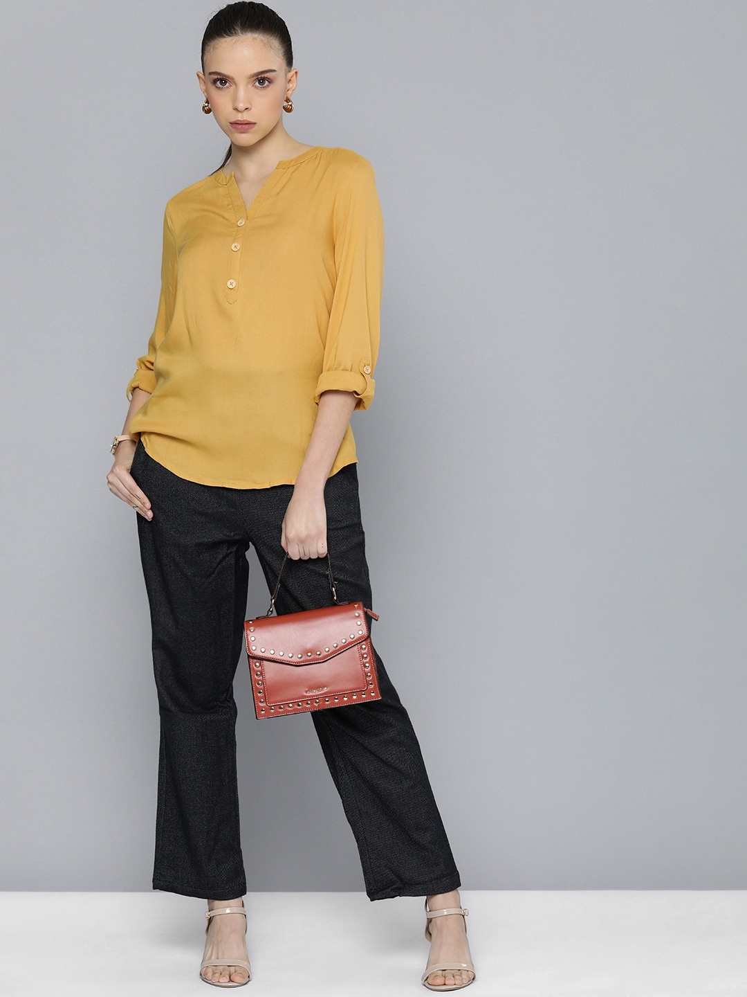 

Chemistry Women Yellow Solid Casual Top