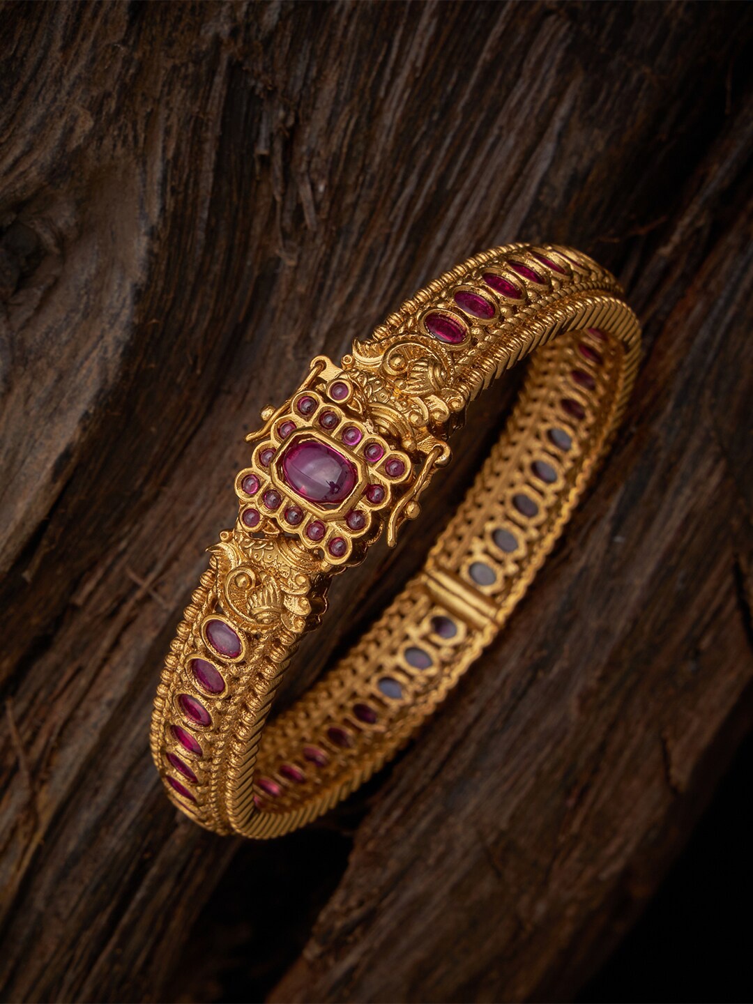 

Kushal's Fashion Jewellery Gold-Plated Ruby Stone-Studded & Beaded Kada