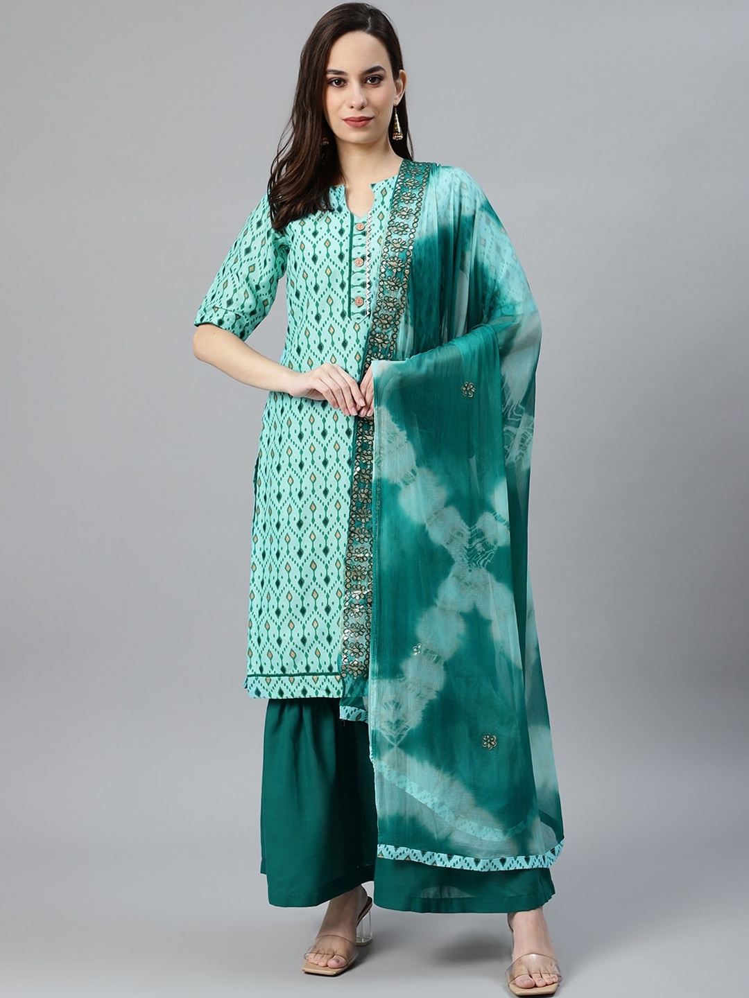 

Chhabra 555 Women Turquoise Blue Ethnic Motifs Printed Gotta Patti Kurta with Sharara & With Dupatta