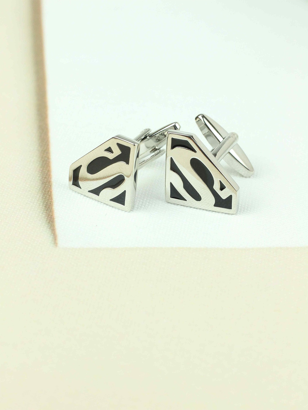 

Tossido Men Silver-Toned & Black Contemporary Cufflink