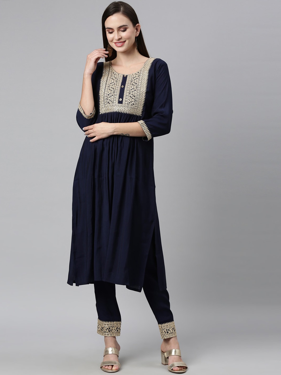 

Neerus Women Navy Blue Ethnic Motifs Yoke Design A-line Kurta with Trousers